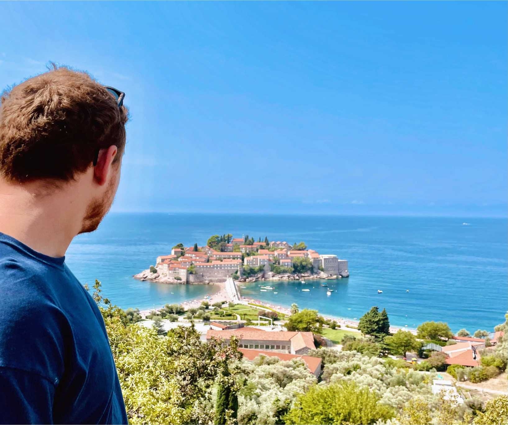 Person enjoying Sveti Stefan great view over Ivano Vidoni beach