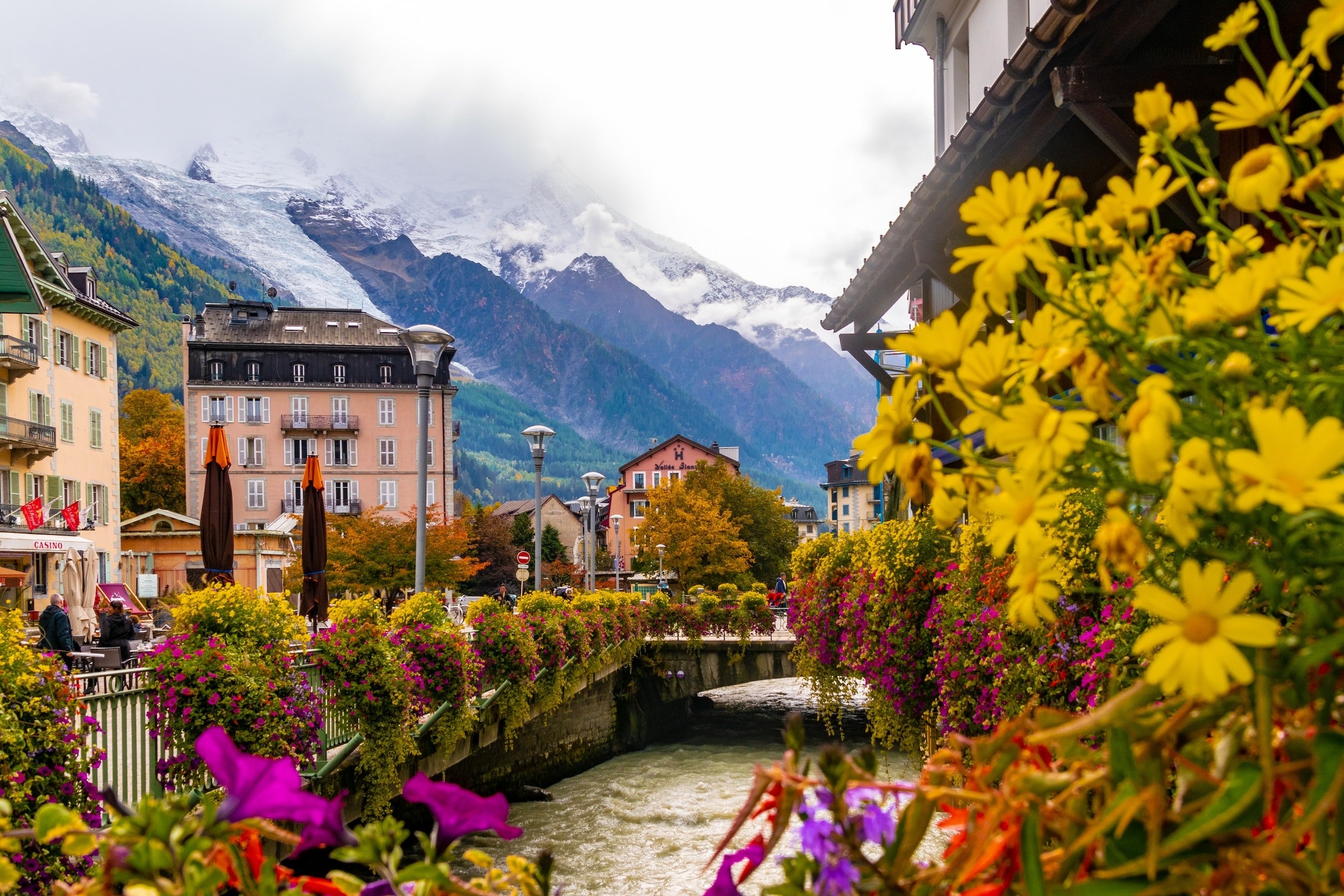 Colourful flowers and snowcapped mountain backdrop in Chamonix town center