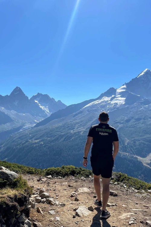 male hiker walking up easy lac blanc hike trail in chamonix mont blanc france